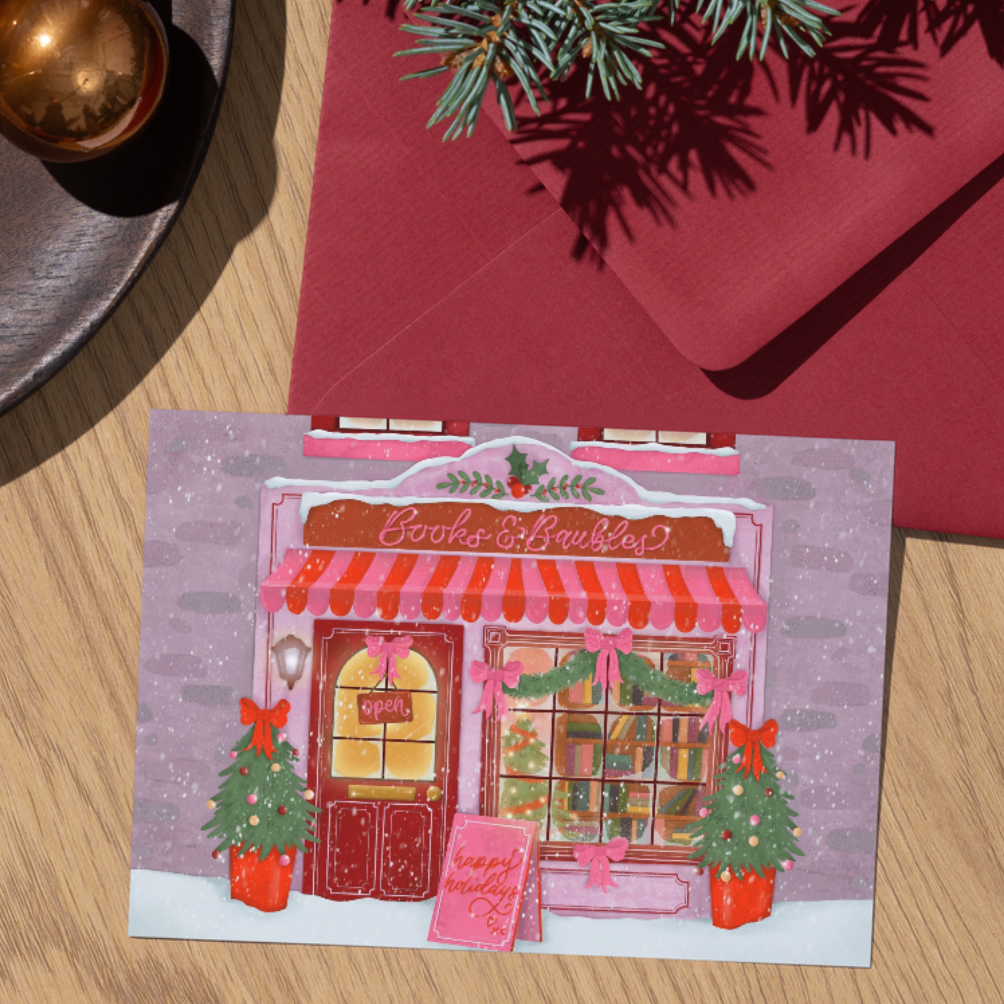 Illustrated Christmas card featuring a festive bookshop